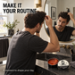 A man styling his hair at a bathroom mirror with hair wax on the counter