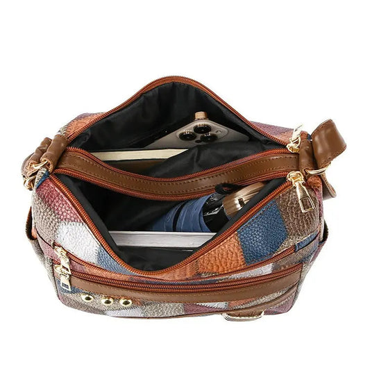 👜New fashion PU soft leather soft leather color matching shoulder bag.